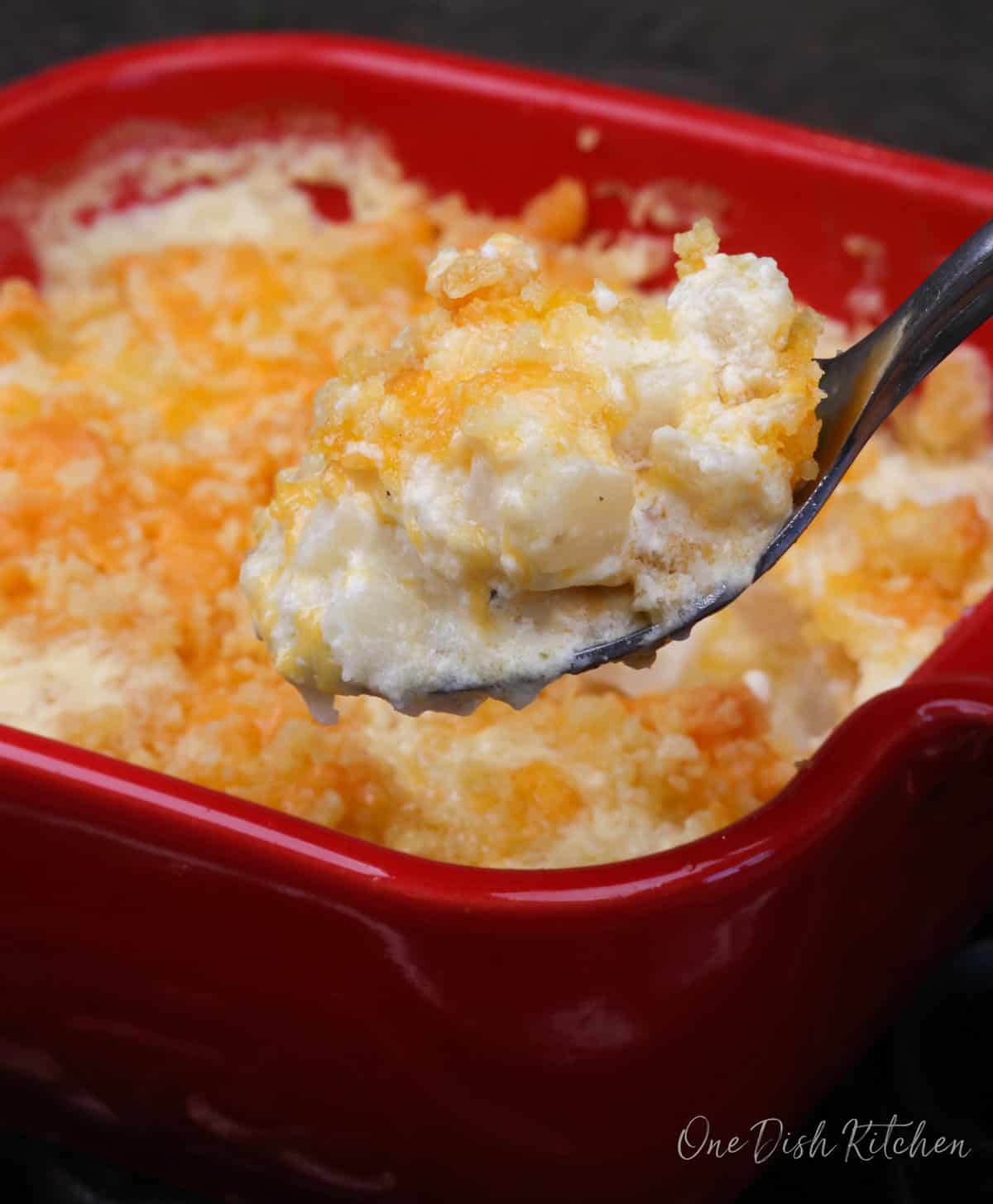 a spoonful of hashbrown casserole over the baking dish.