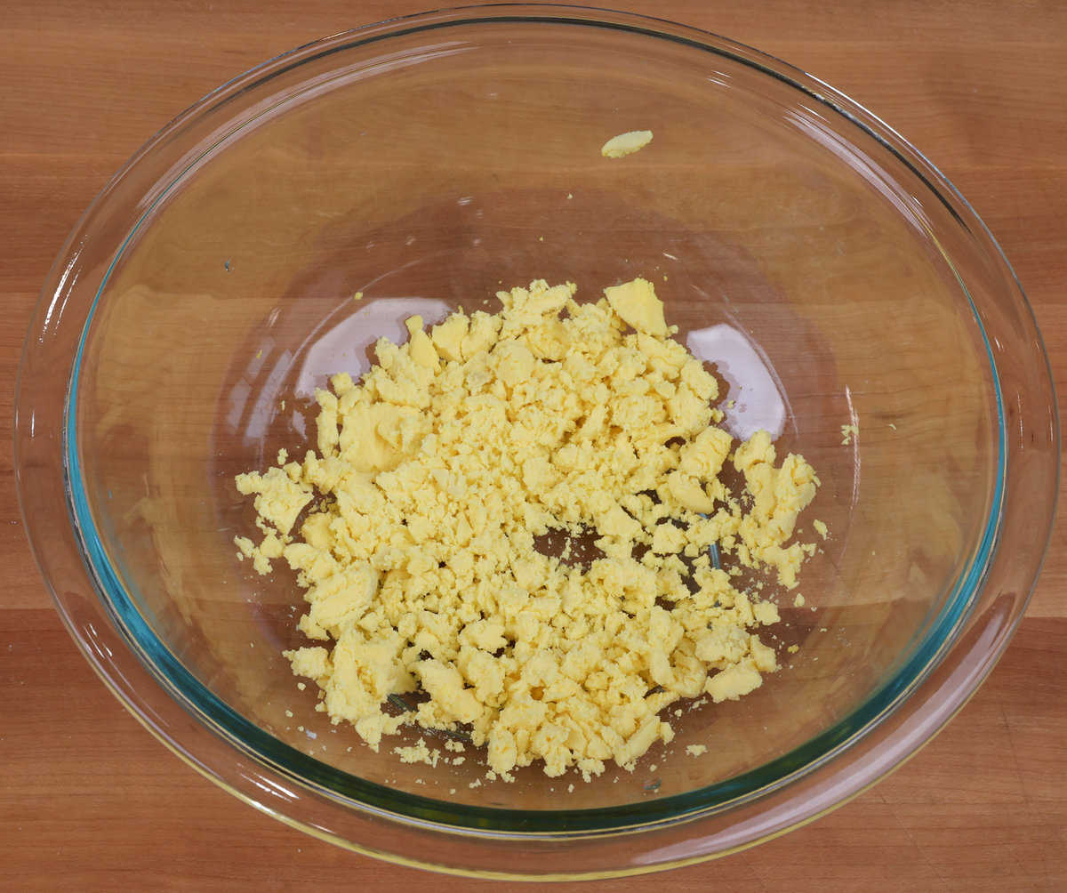 mashed hard boiled egg yolks in a bowl.