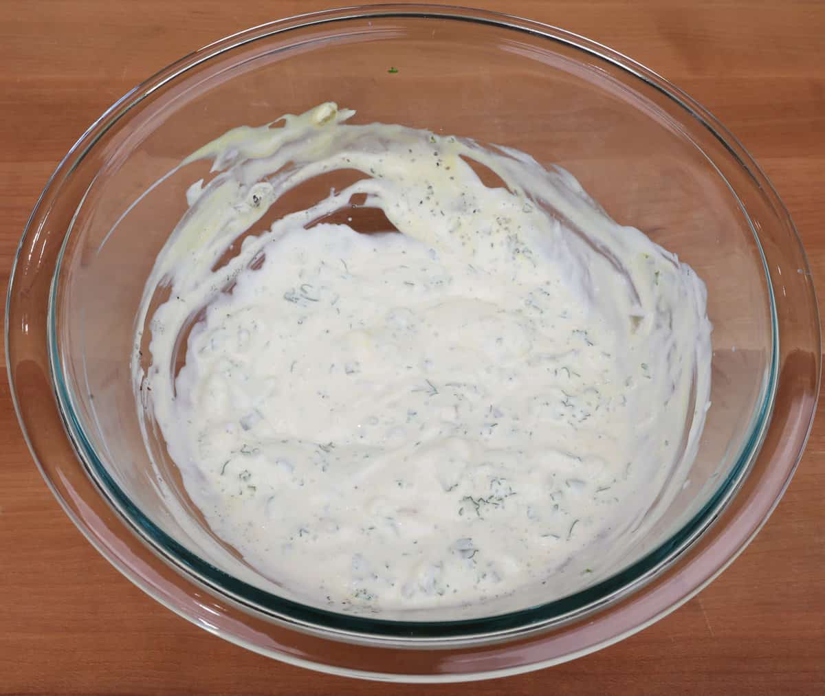 macaroni salad dressing in a small bowl.