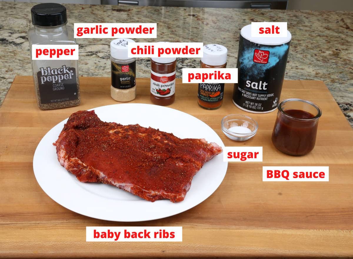 oven baked ribs ingredients on a kitchen counter.