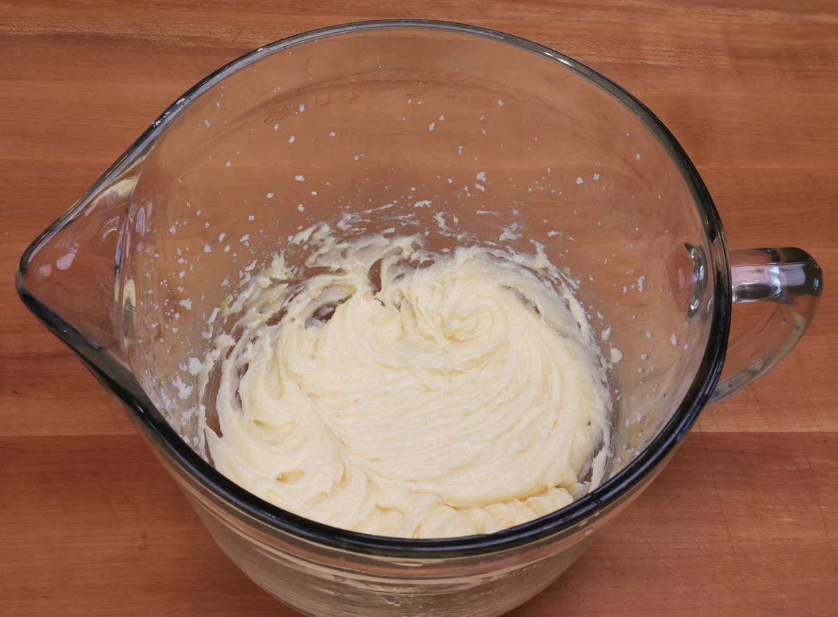 egg, vanilla, butter and sugar mixed together in a large bowl.