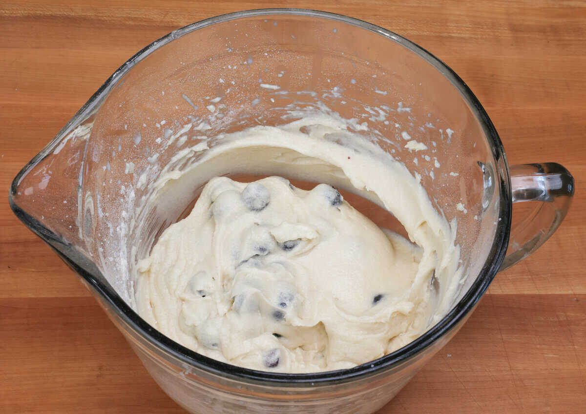 blueberry cake batter in a mixing bowl.