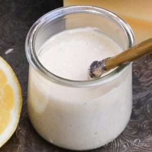 a small jar of homemade caesar salad dressing.
