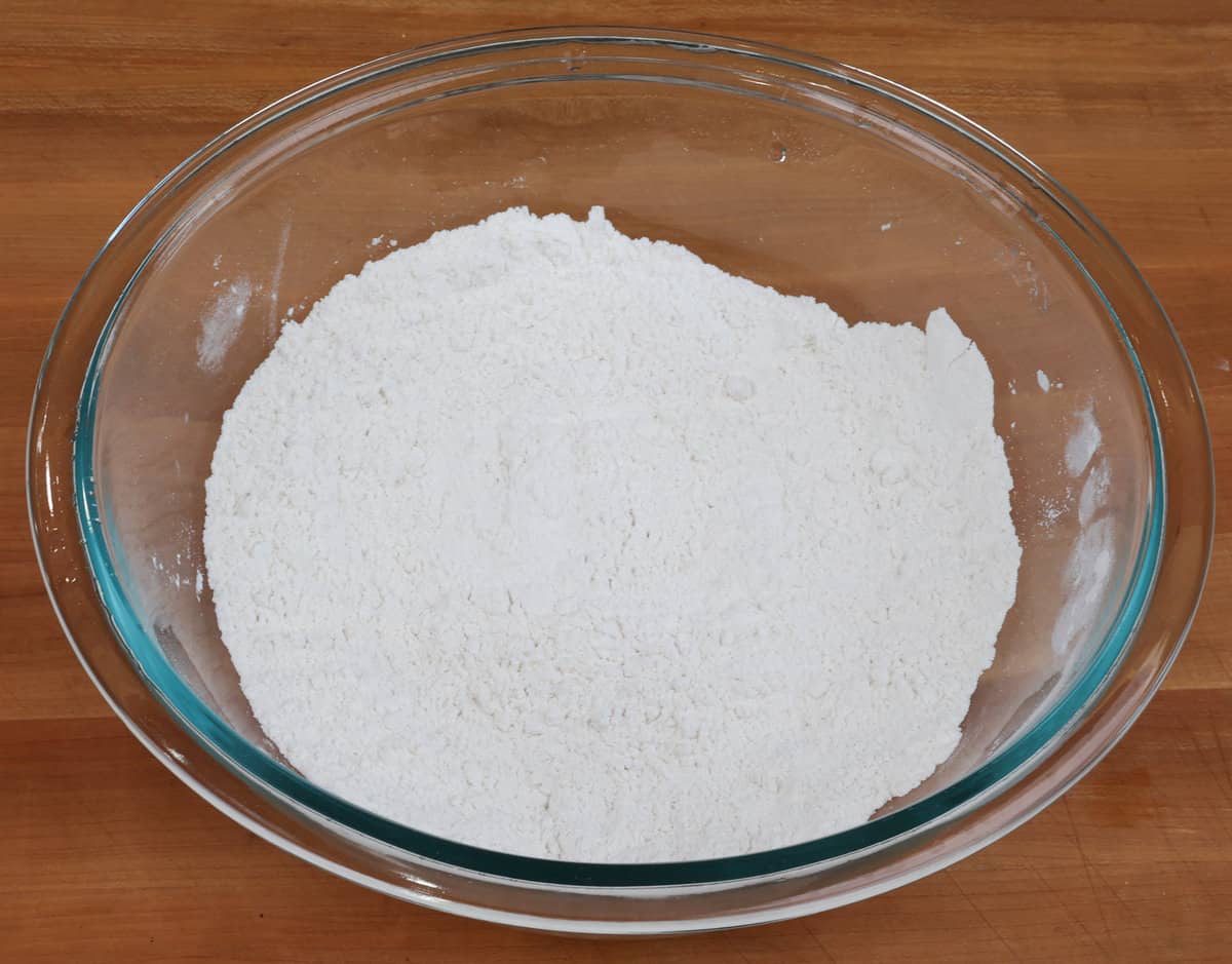 flour, baking powder, sugar and salt in a mixing bowl.