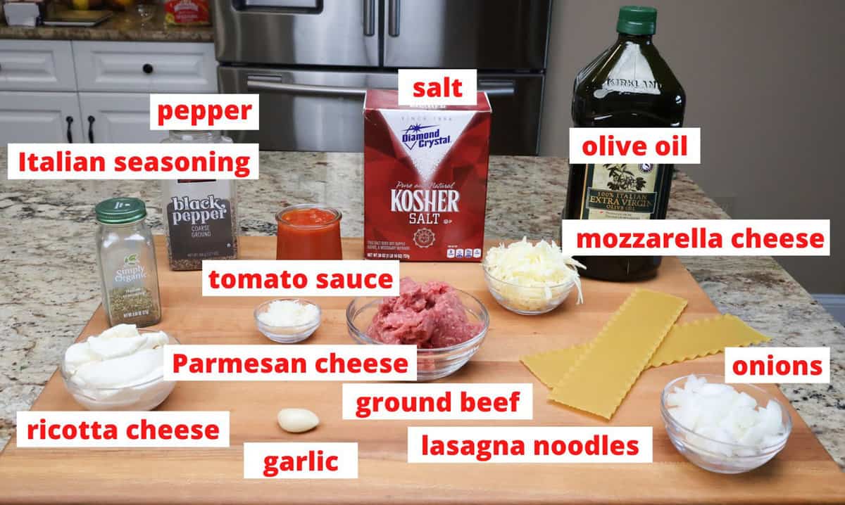 sheet pan lasagna ingredients on a kitchen counter.