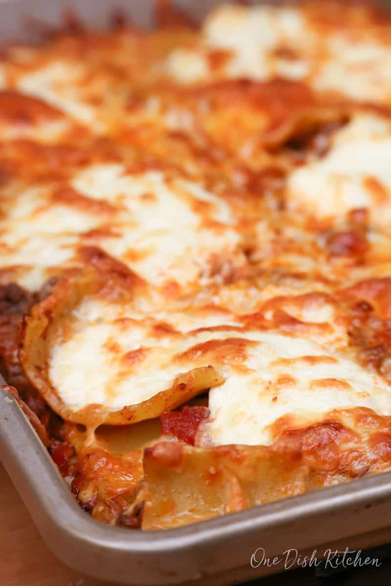 baked sheet pan lasagna in one layer on a baking sheet.