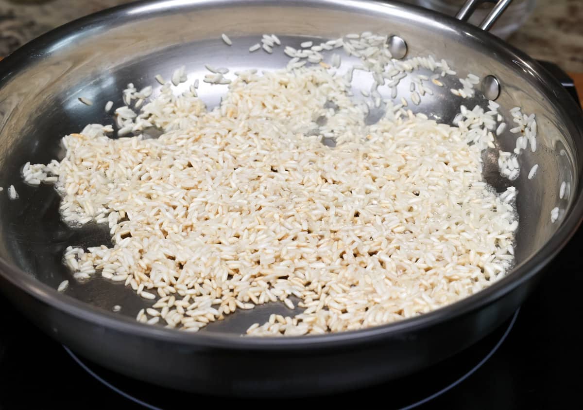 rice browning in a skillet.