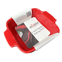 red square baking dish with promotional sleeve around it.