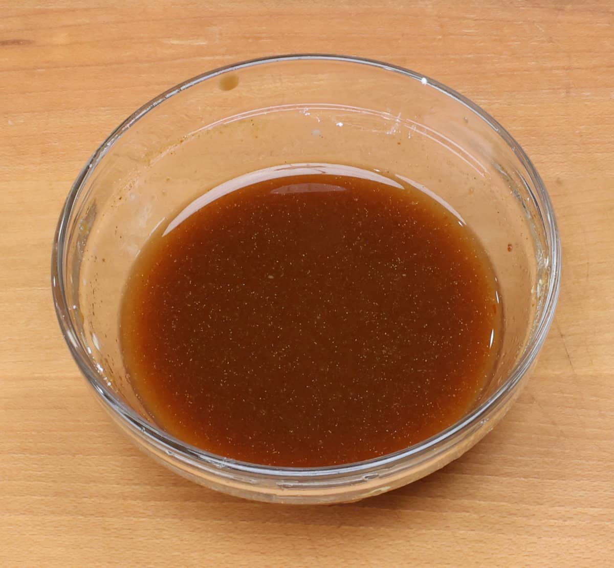 kung pao chicken sauce in a small bowl.