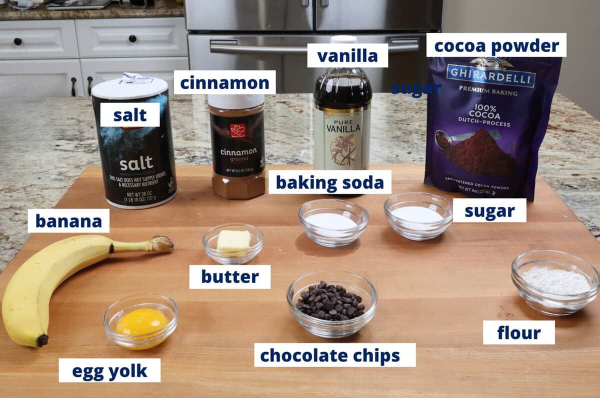 Chocolate banana bread ingredients on a kitchen counter.