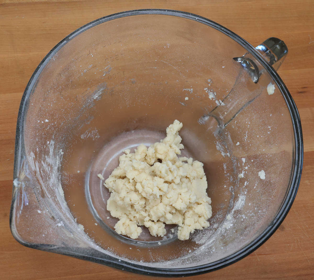 pie crust dough in a mixing bowl.