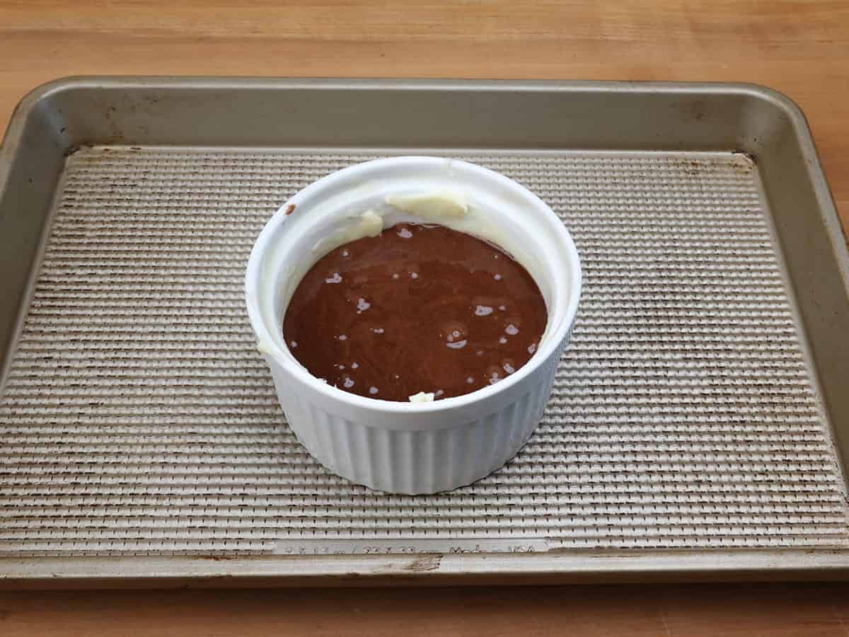 unbaked chocolate lava cake in a ramekin.