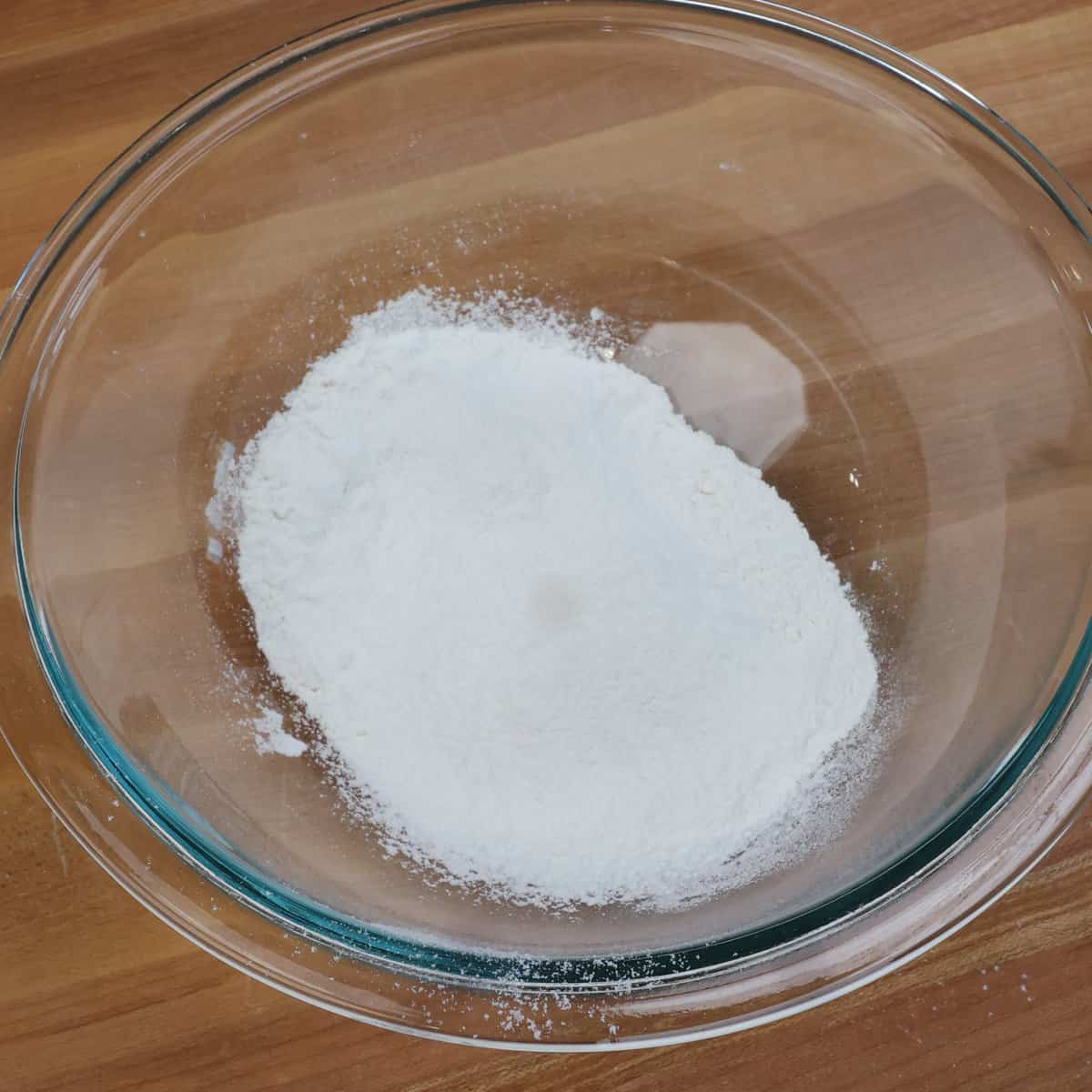 flour, baking soda, baking powder, and salt in a mixing bowl.