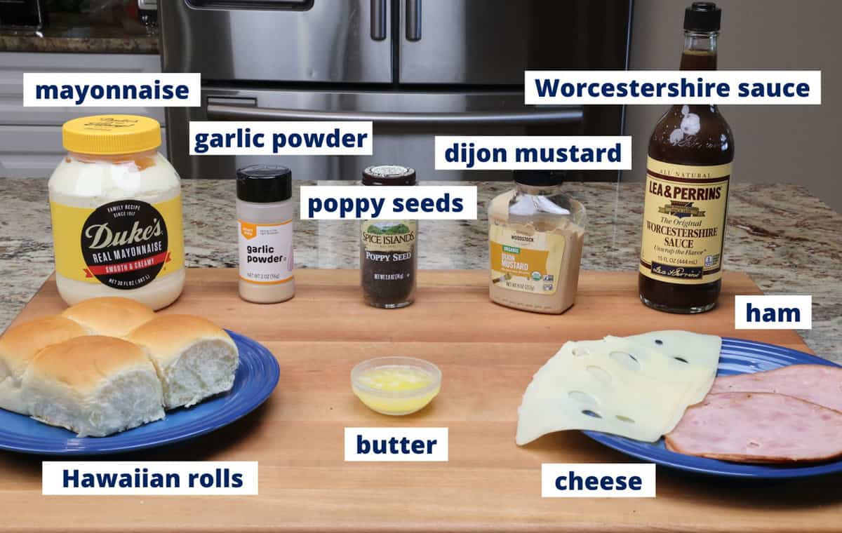 ingredients in ham and cheese sliders on a kitchen counter.