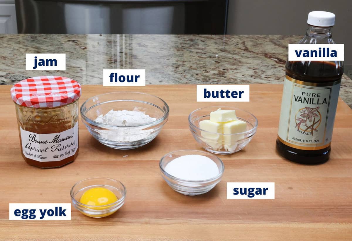ingredients to make thumbprint cookies on a kitchen counter.