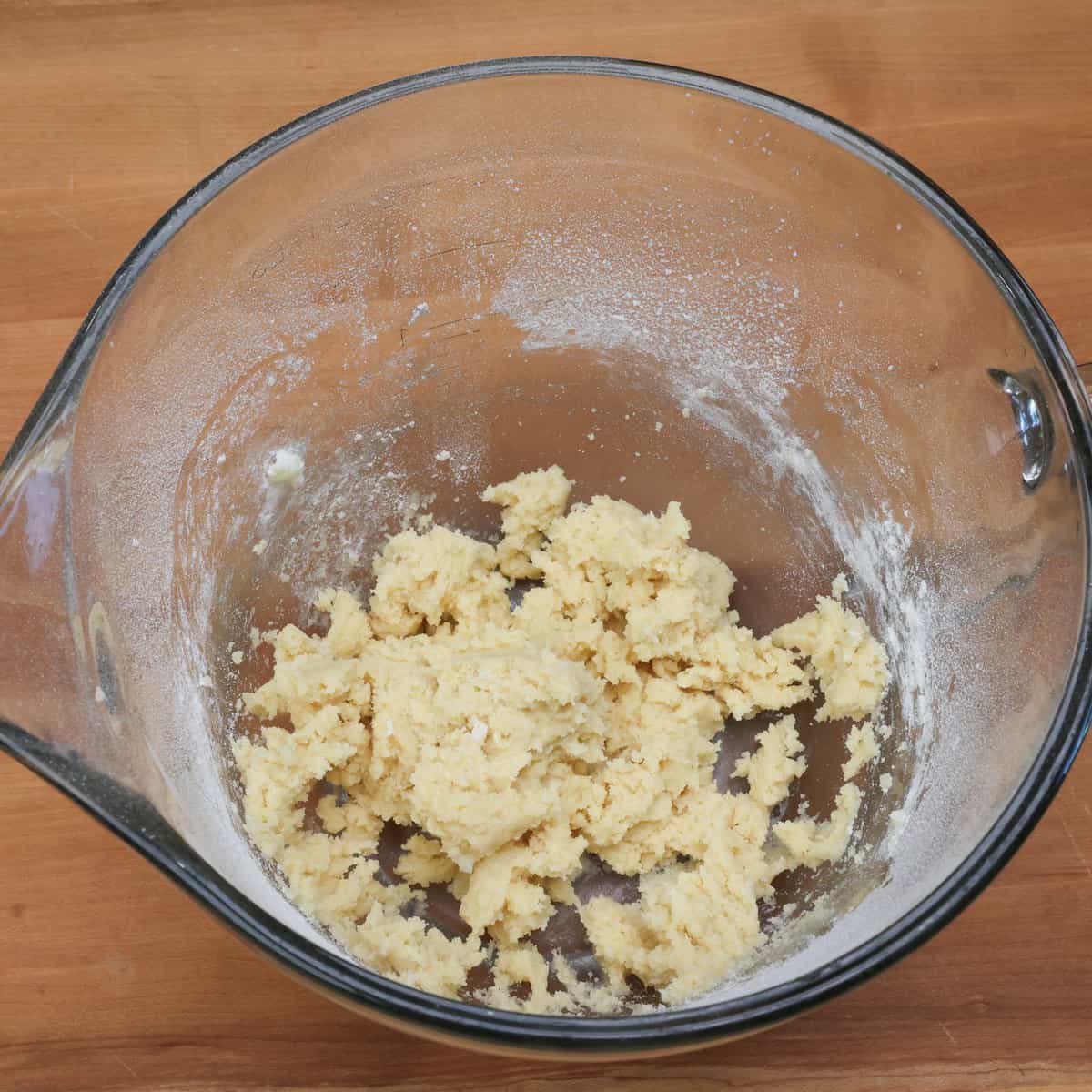 thumbprint cookie dough in a mixing bowl.