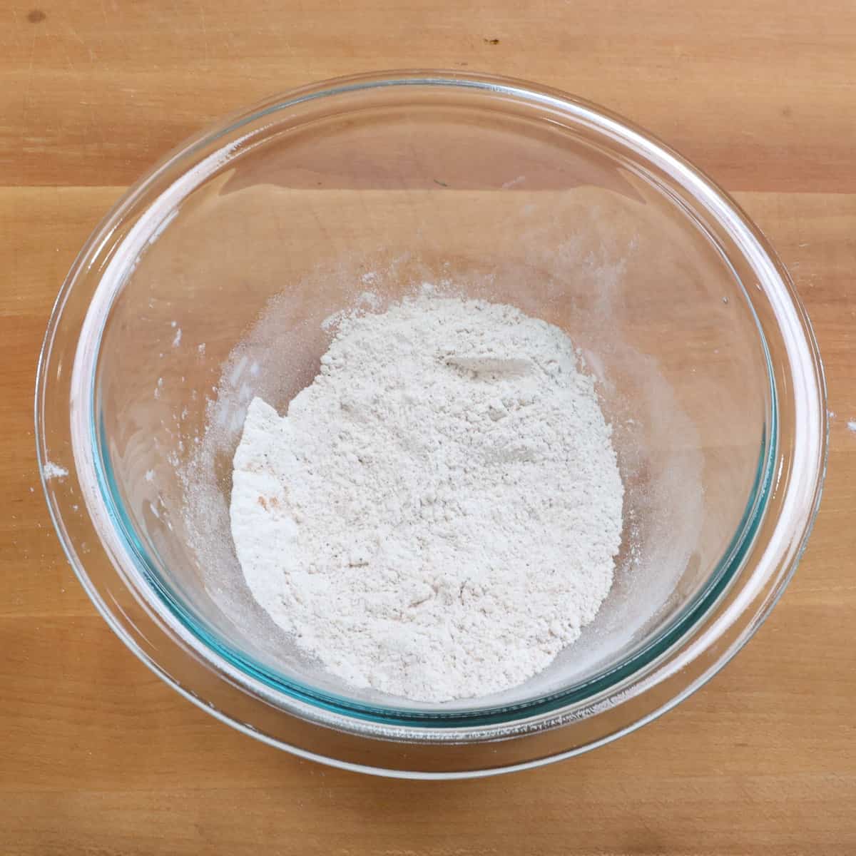 flour, baking soda, cinnamon, and salt in a mixing bowl.
