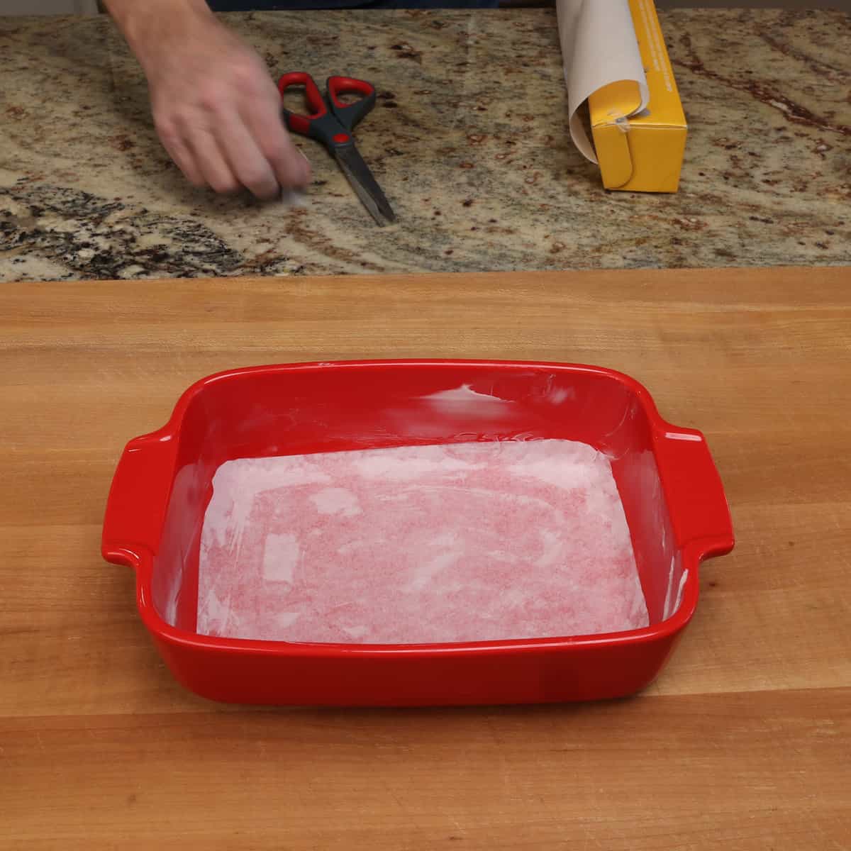 a baking dish lined with parchment paper.
