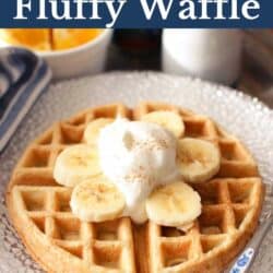 one waffle with bananas and cream on top.