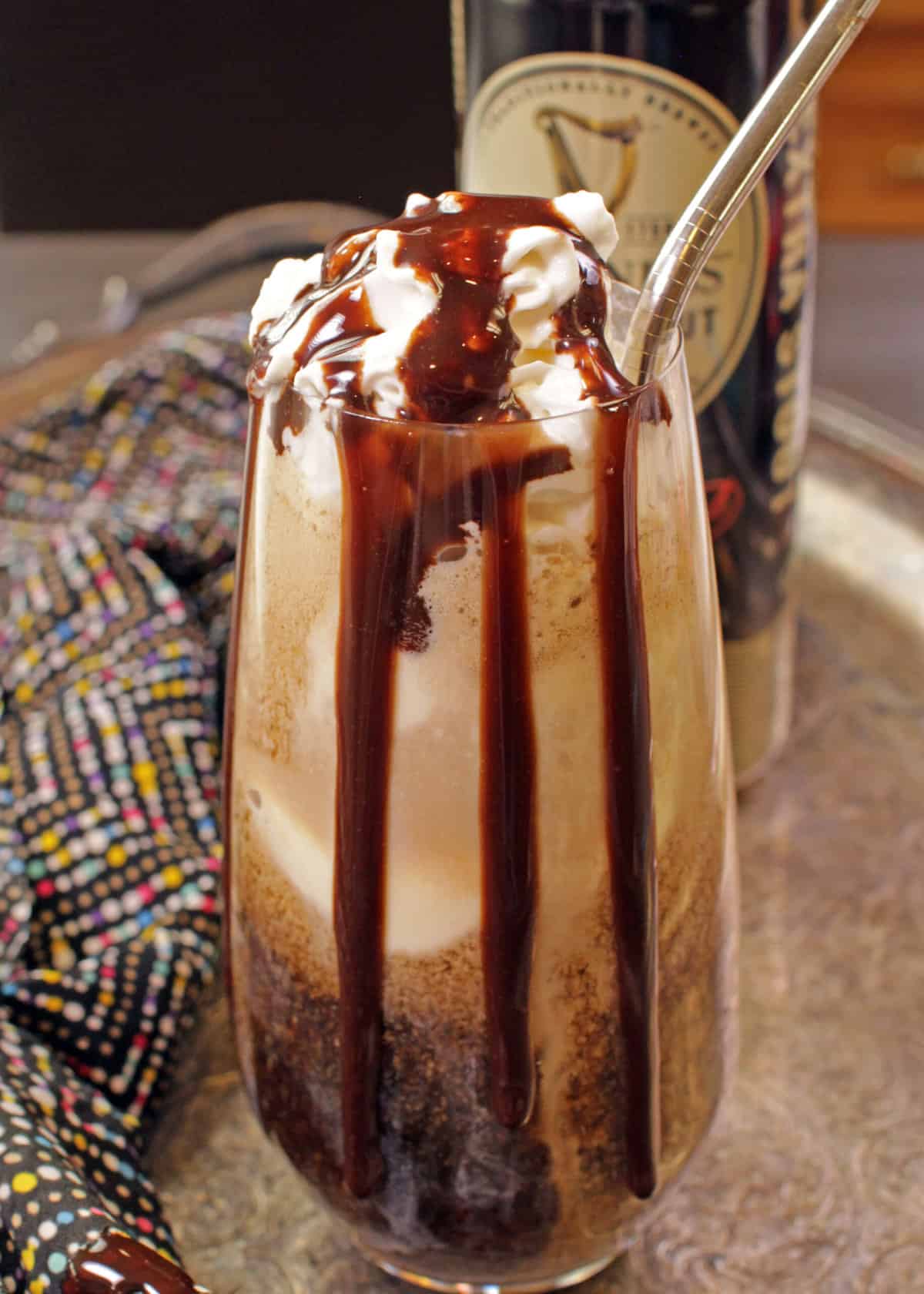 a glass filled with Guinness with vanilla ice cream on top.