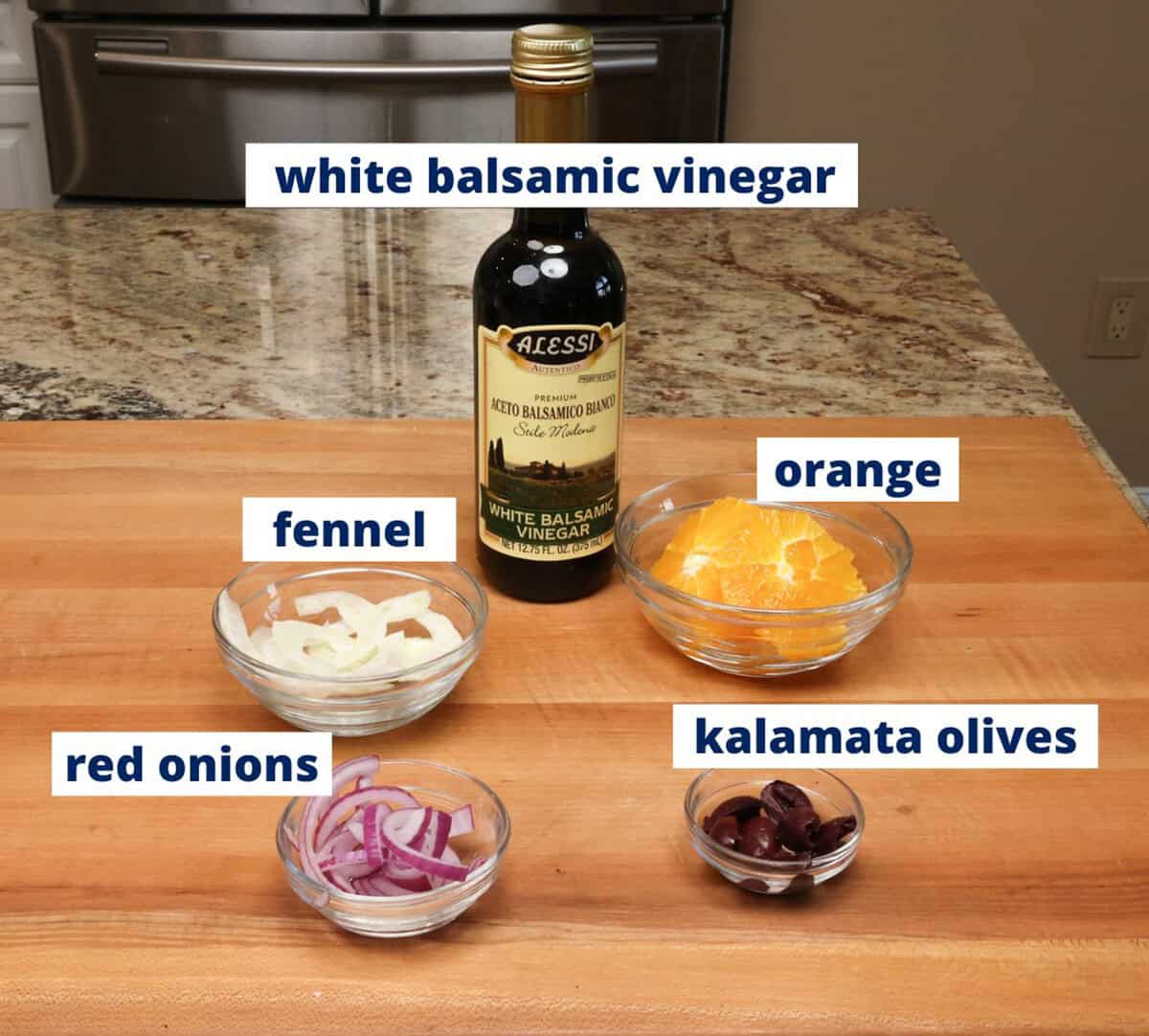 ingredients for sicilian orange salad on a kitchen counter.