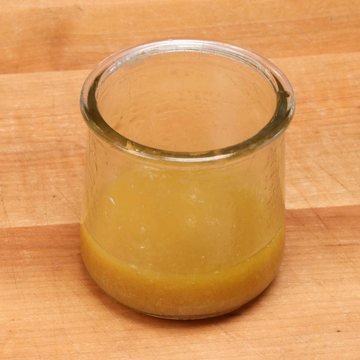 a small jar of homemade coleslaw dressing.