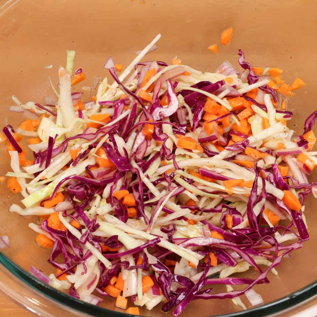 vinegar coleslaw in a mixing bowl.