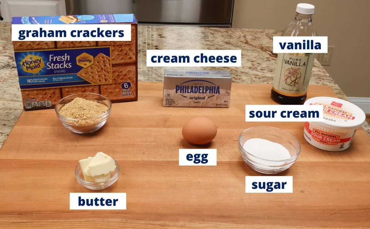 cheesecake bars ingredients on a kitchen counter.