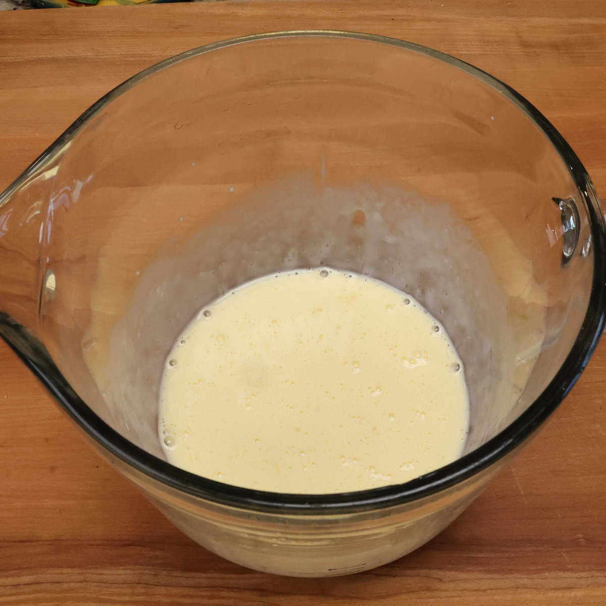 cream and eggs in a mixing bowl.