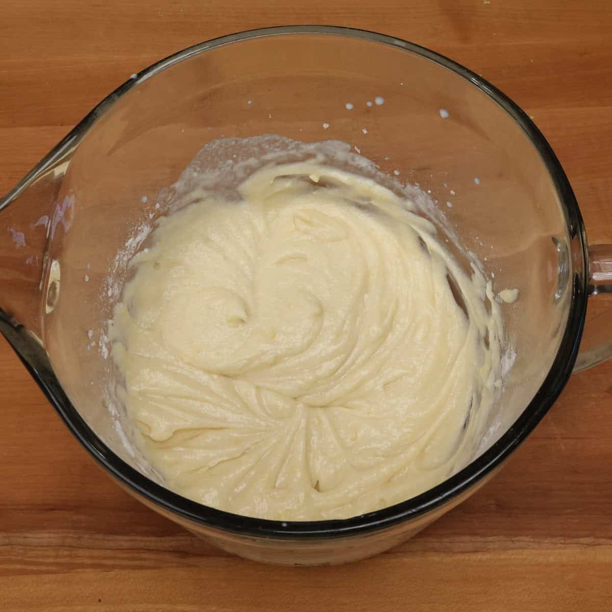 lemon cake batter in a mixing bowl.