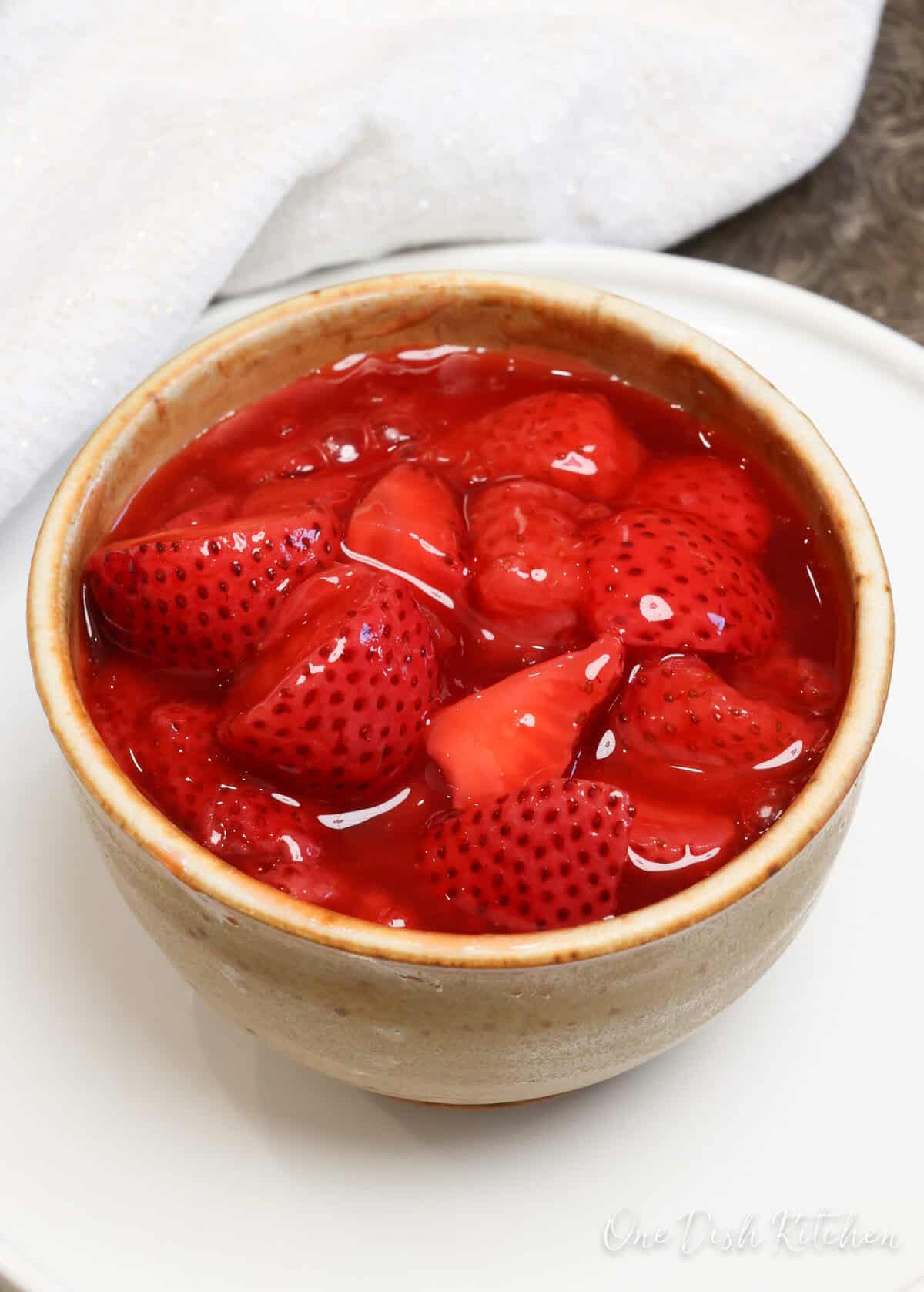 a bowl of homemade strawberry pie filling.