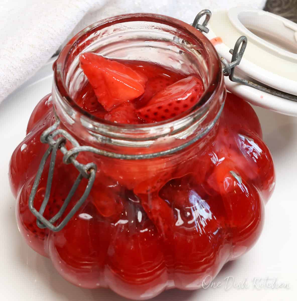 a jar of strawberry pie filling.