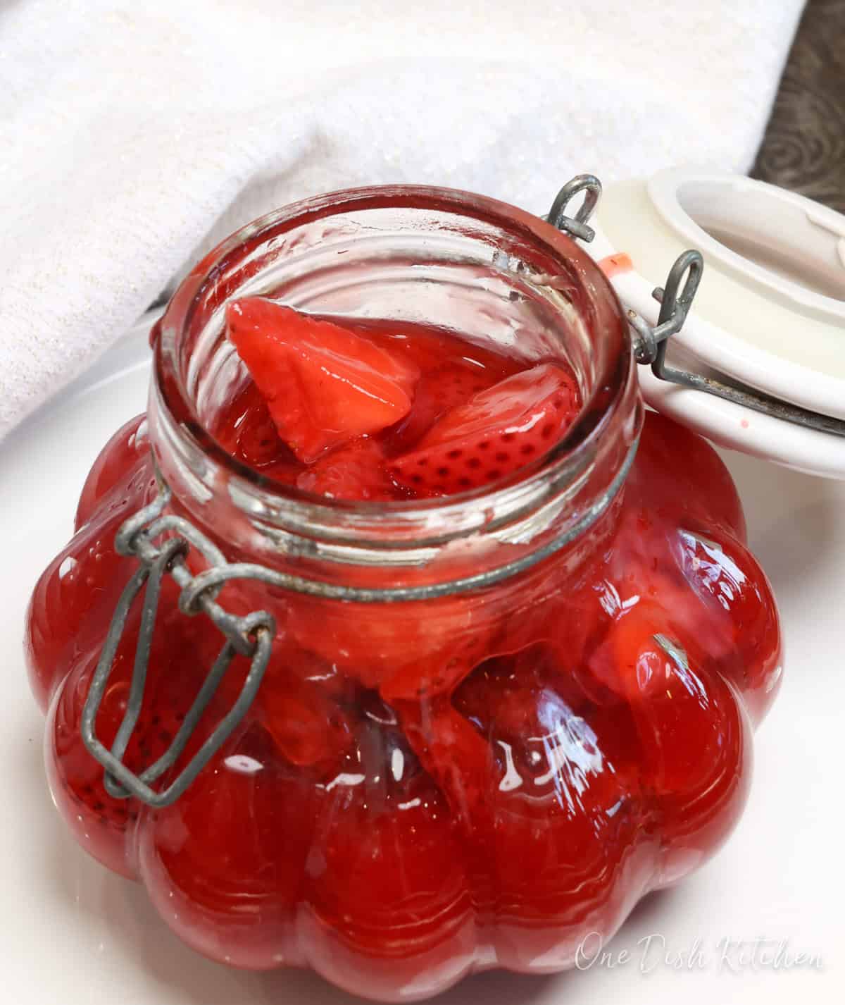 a jar of strawberry pie filling.