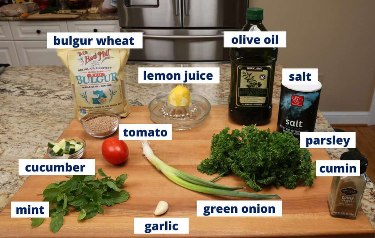 tabbouleh ingredients on a kitchen counter.