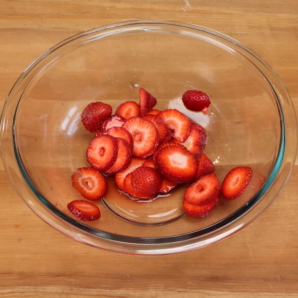 a bowl of macerated strawberries.