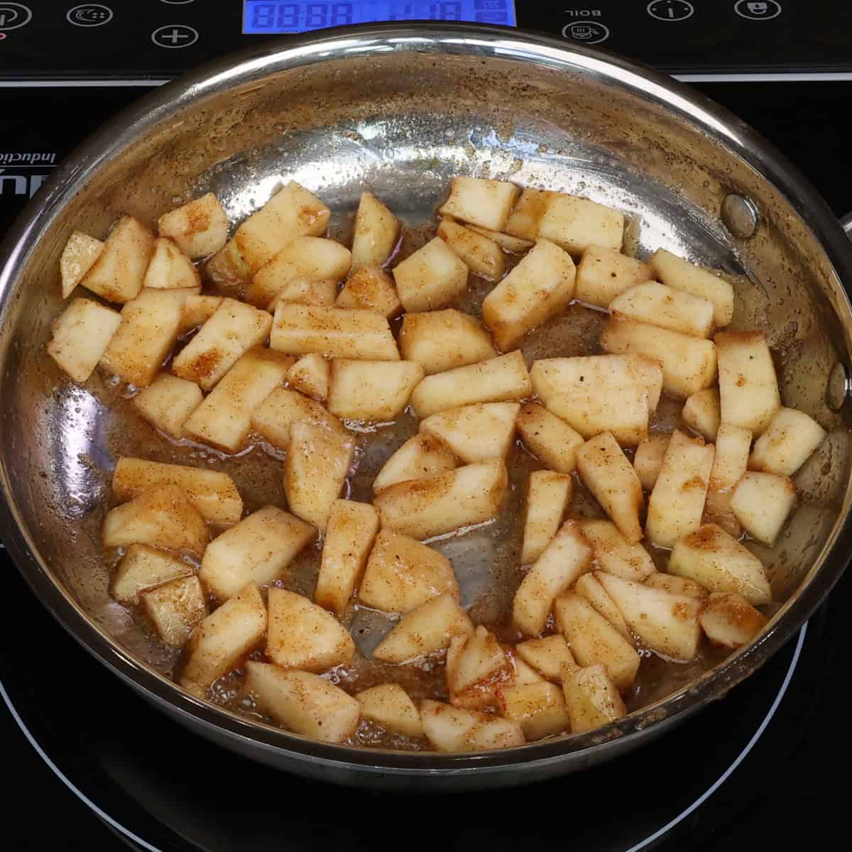 chopped apples in melted butter, brown sugar, and cinnamon in a small skillet.