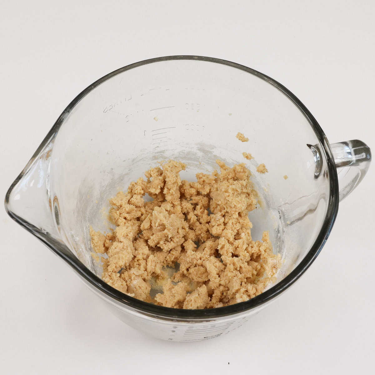 spiced cookie dough in a mixing bowl.