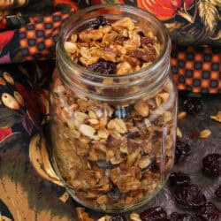 a mason jar filled with maple granola.