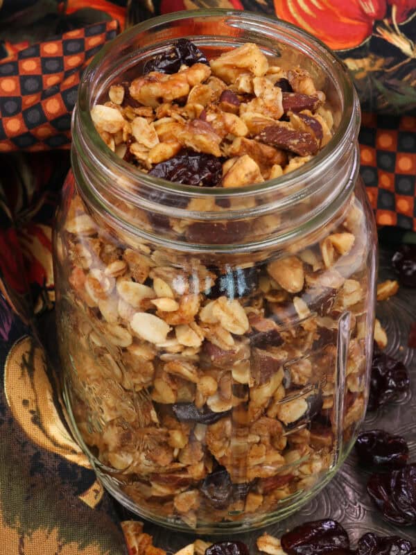 a mason jar filled with maple granola.