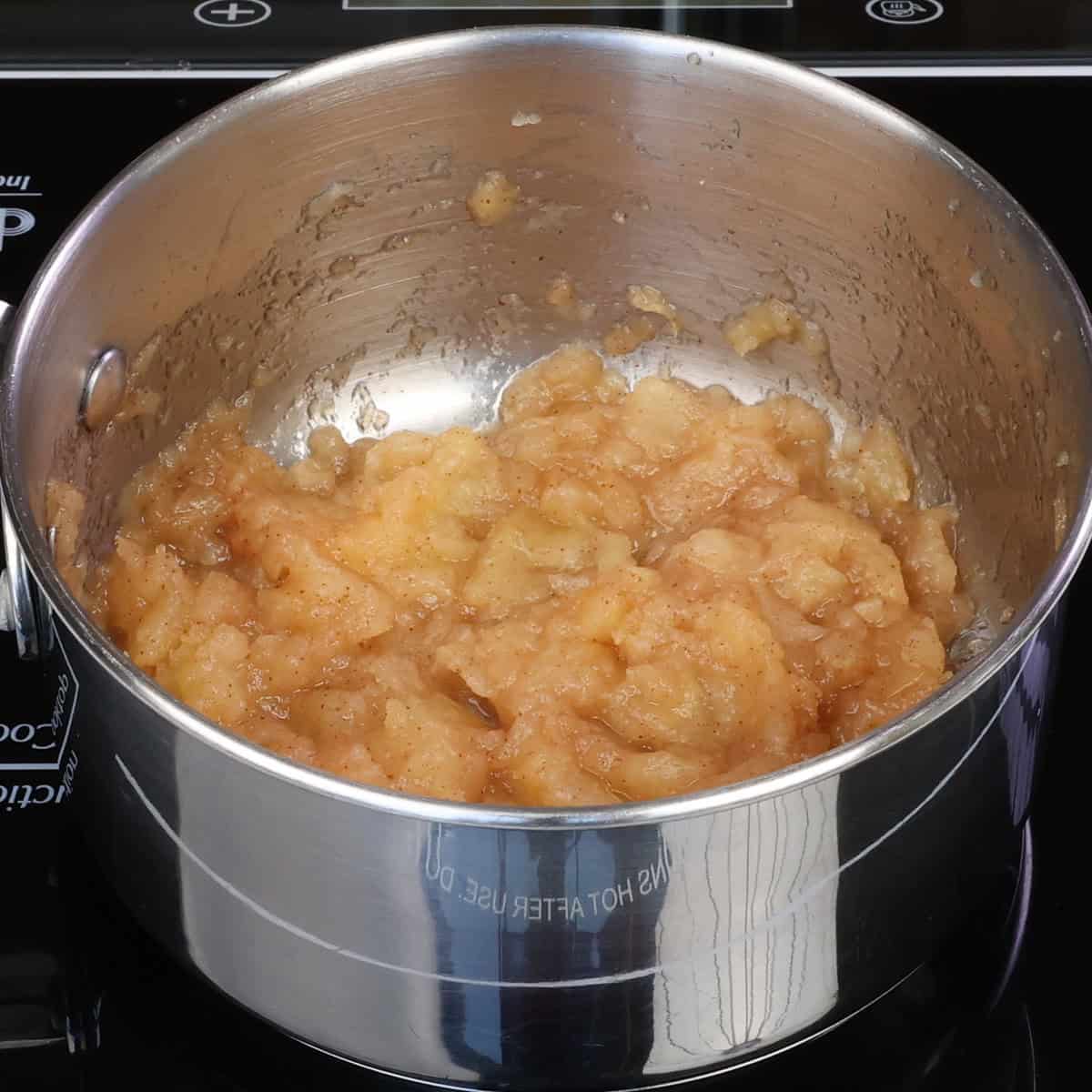 homemade applesauce in a small pot.