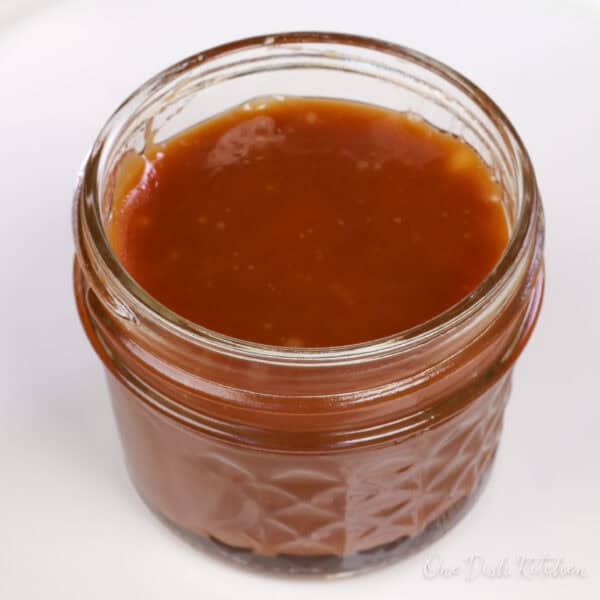 a small jar of homemade caramel sauce.