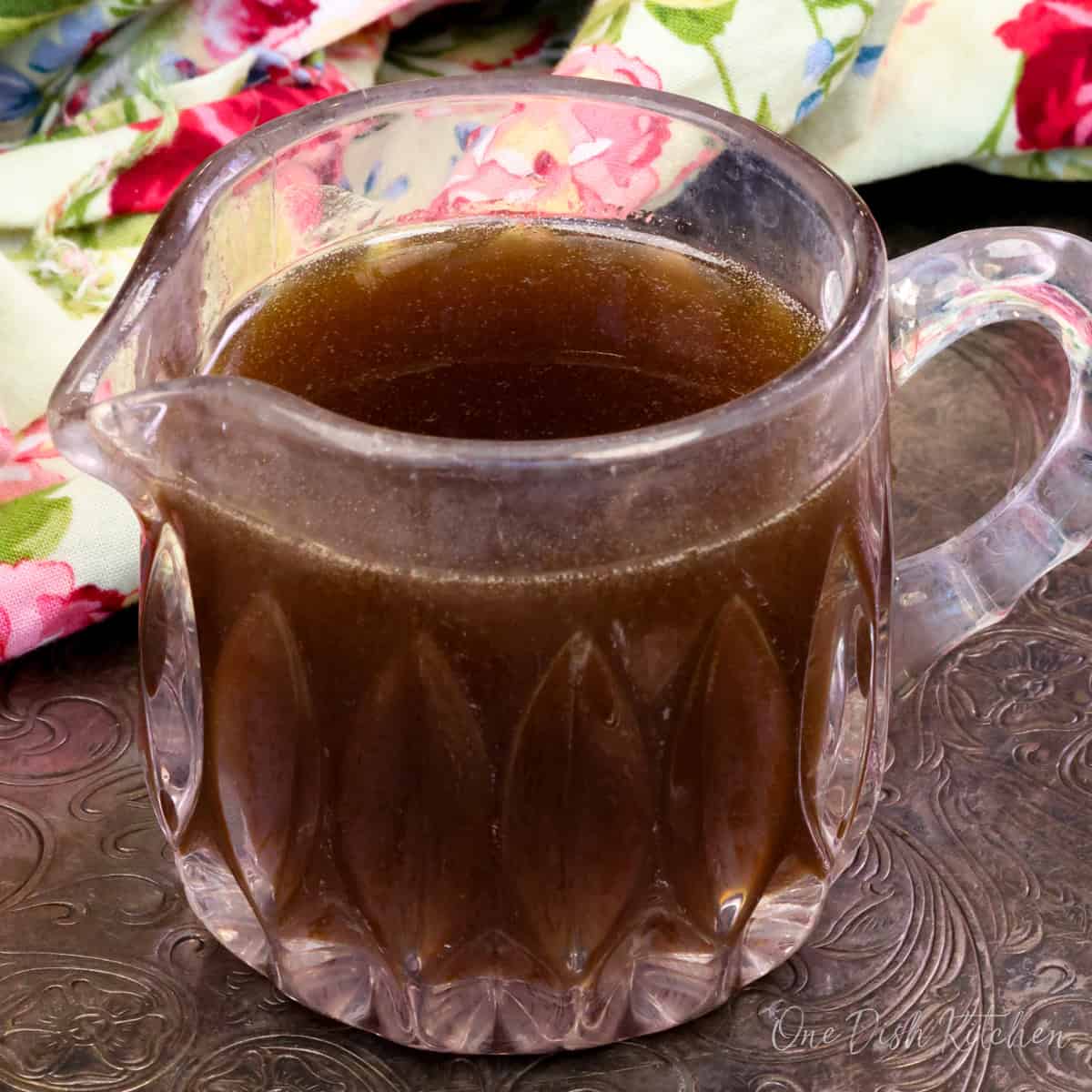 a small batch of pancake syrup in a glass jar.