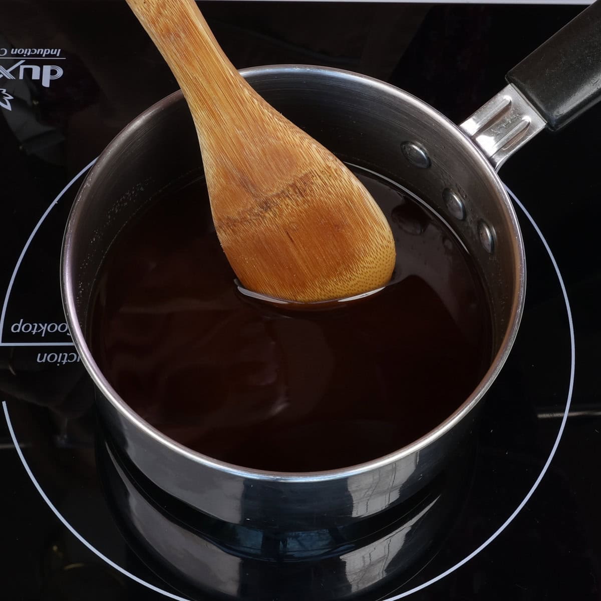 brown sugar and water simmering in a pot.