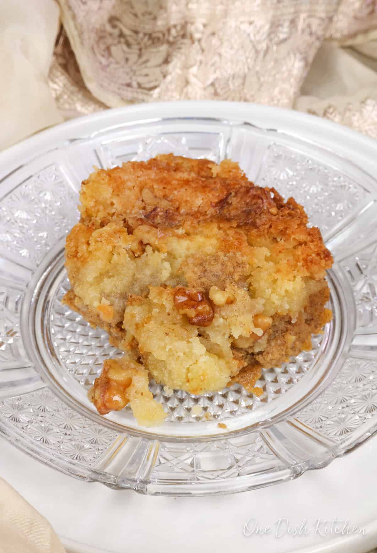 a serving of pumpkin cake on a white plate.