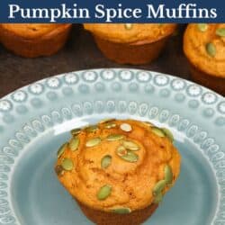 one pumpkin muffin on a green plate next to 5 muffins on a tray.