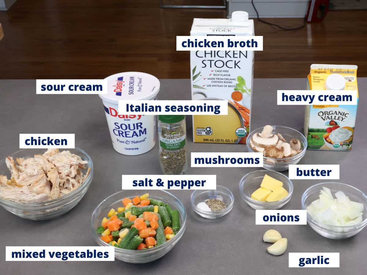 chicken and biscuits casserole ingredients on a kitchen counter.