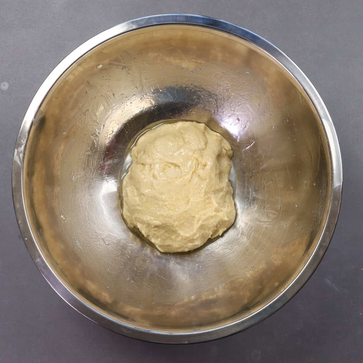 king cake dough in a bowl getting ready for its first rise.