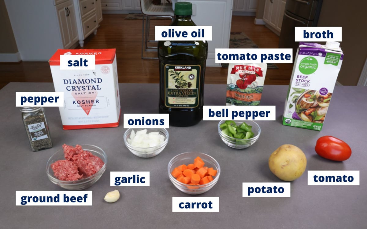 hamburger soup ingredients on a kitchen counter.