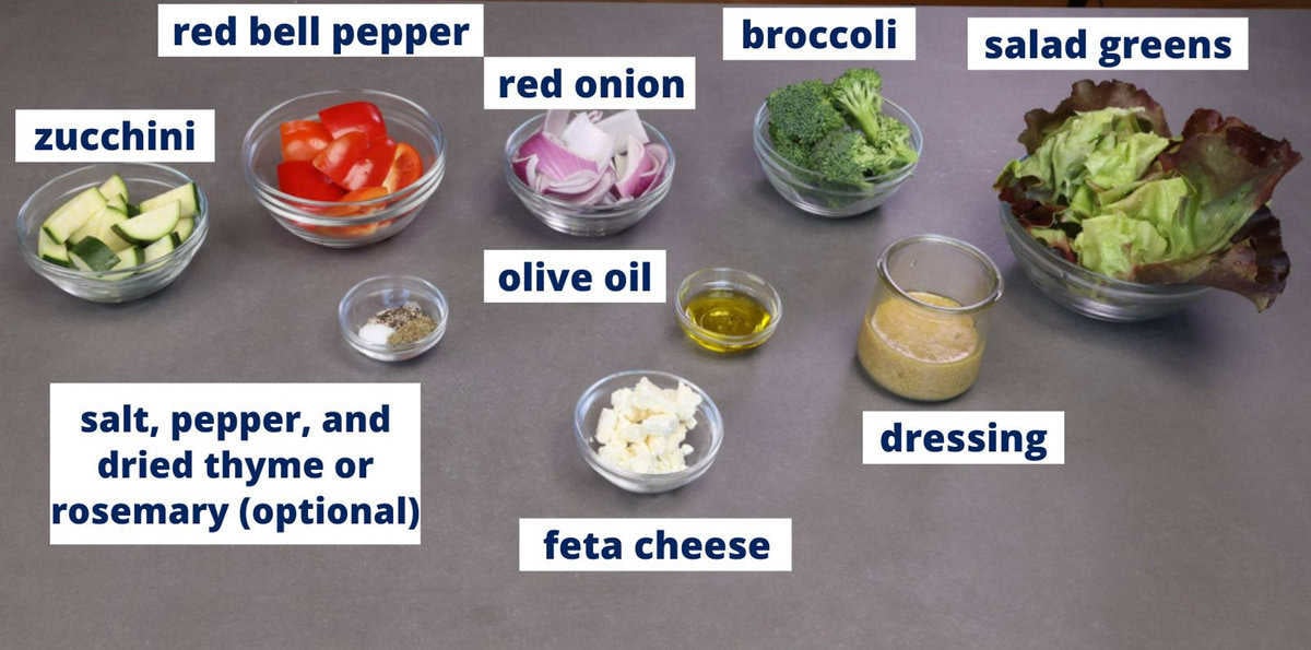 roasted vegetable salad ingredients on a kitchen counter.
