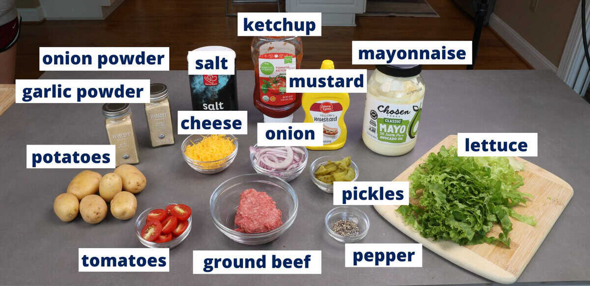 ingredients for a burger bowl and burger sauce on a kitchen counter.